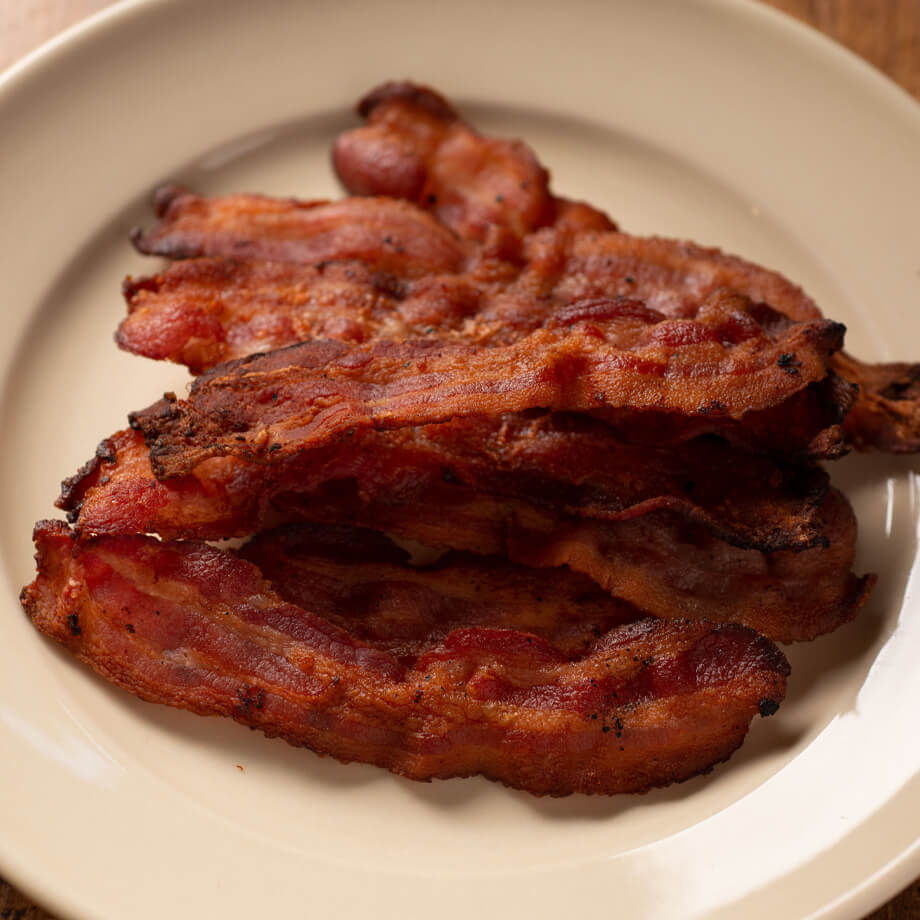 pile of bacon on a plate