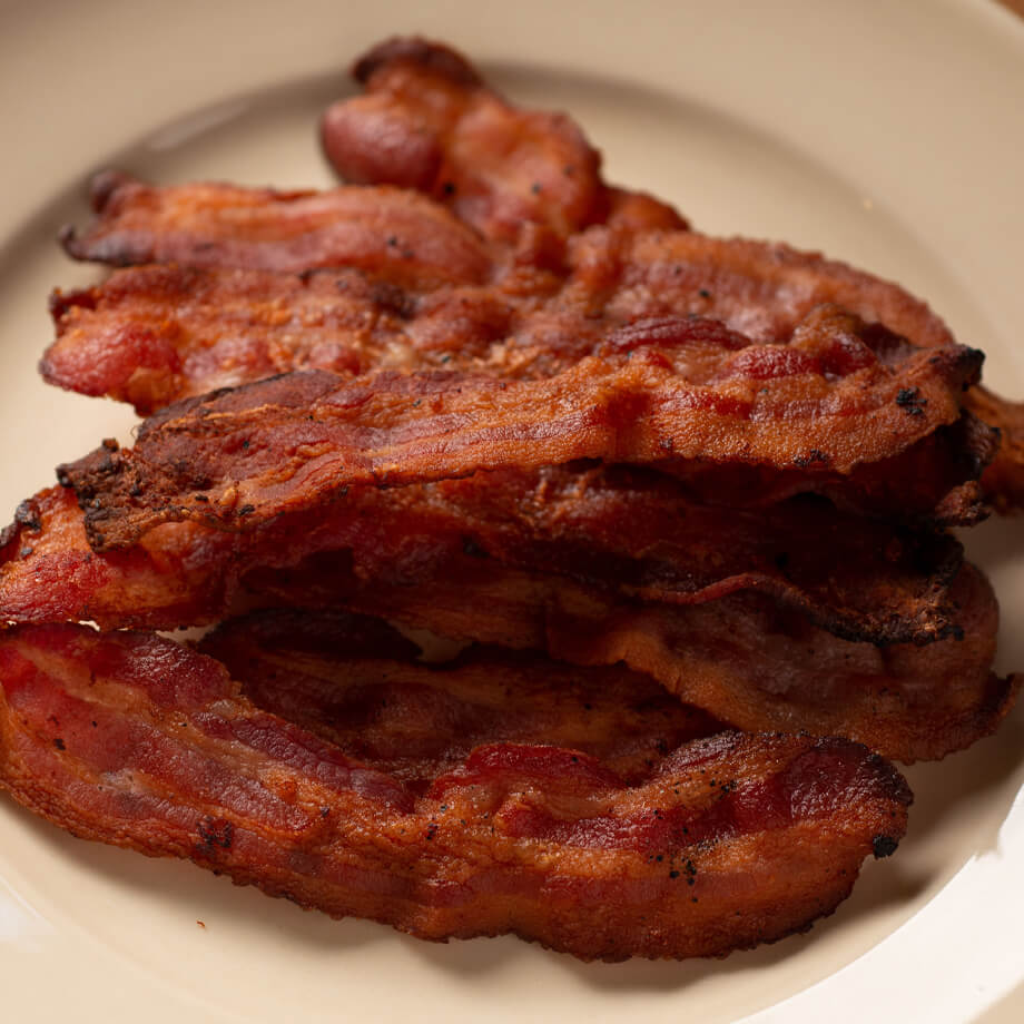 cooked bacon on plate