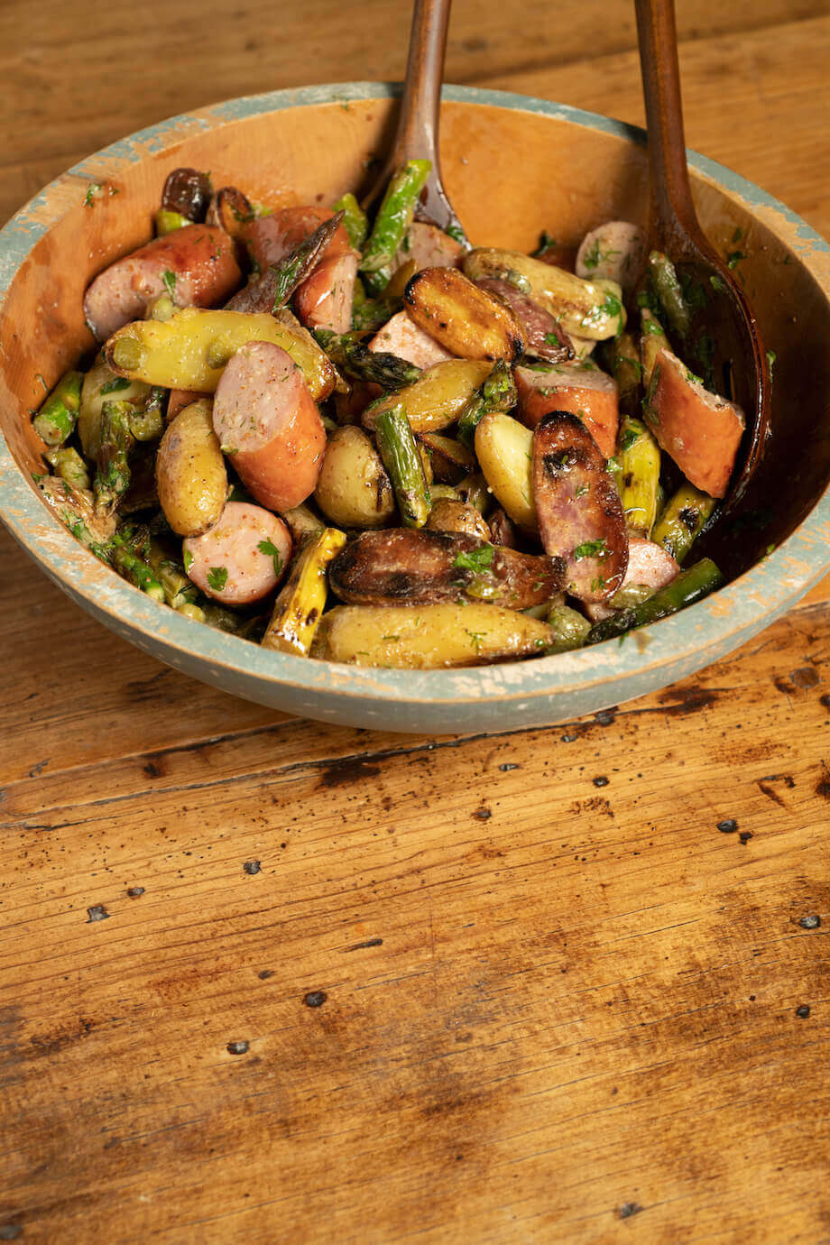 Kielbasa and roasted vegetables in a bowl